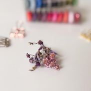 Staalpakketje van droogbloemen voor doopsuiker - Atelier D