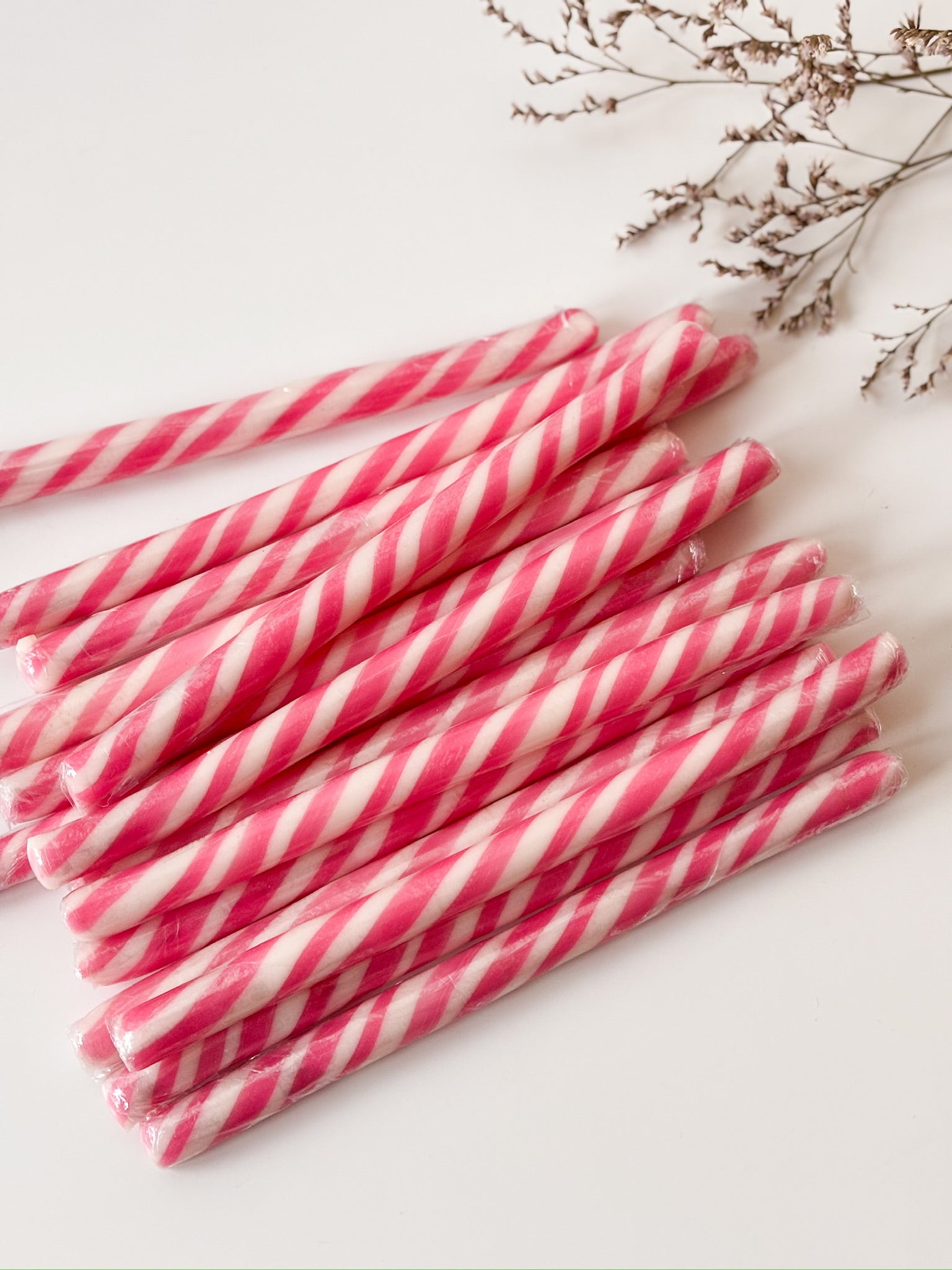 Zuurstokken in roze voor doopsuiker - Atelier D